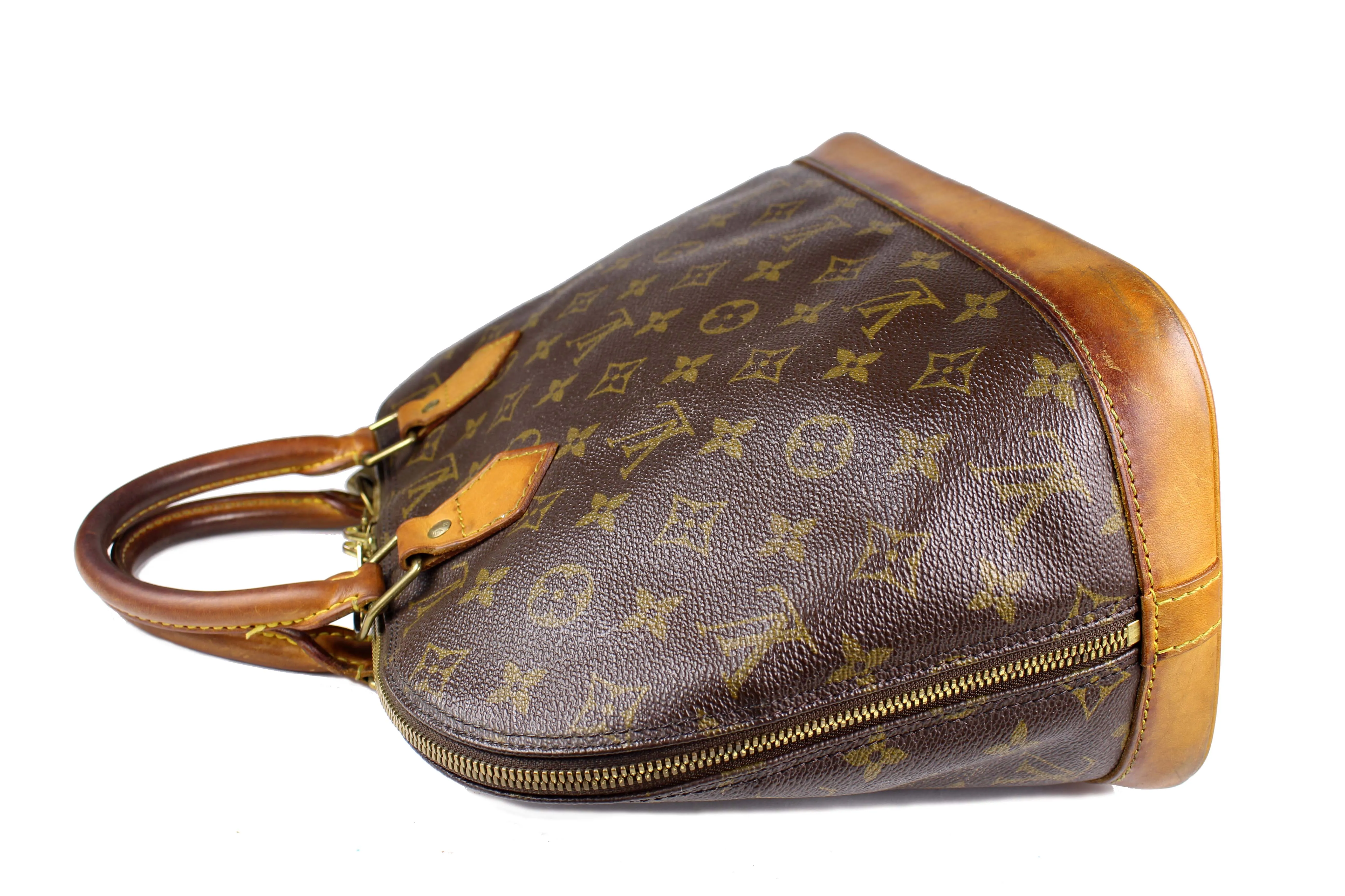 LOUIS VUITTON Alma monogram canvas bag