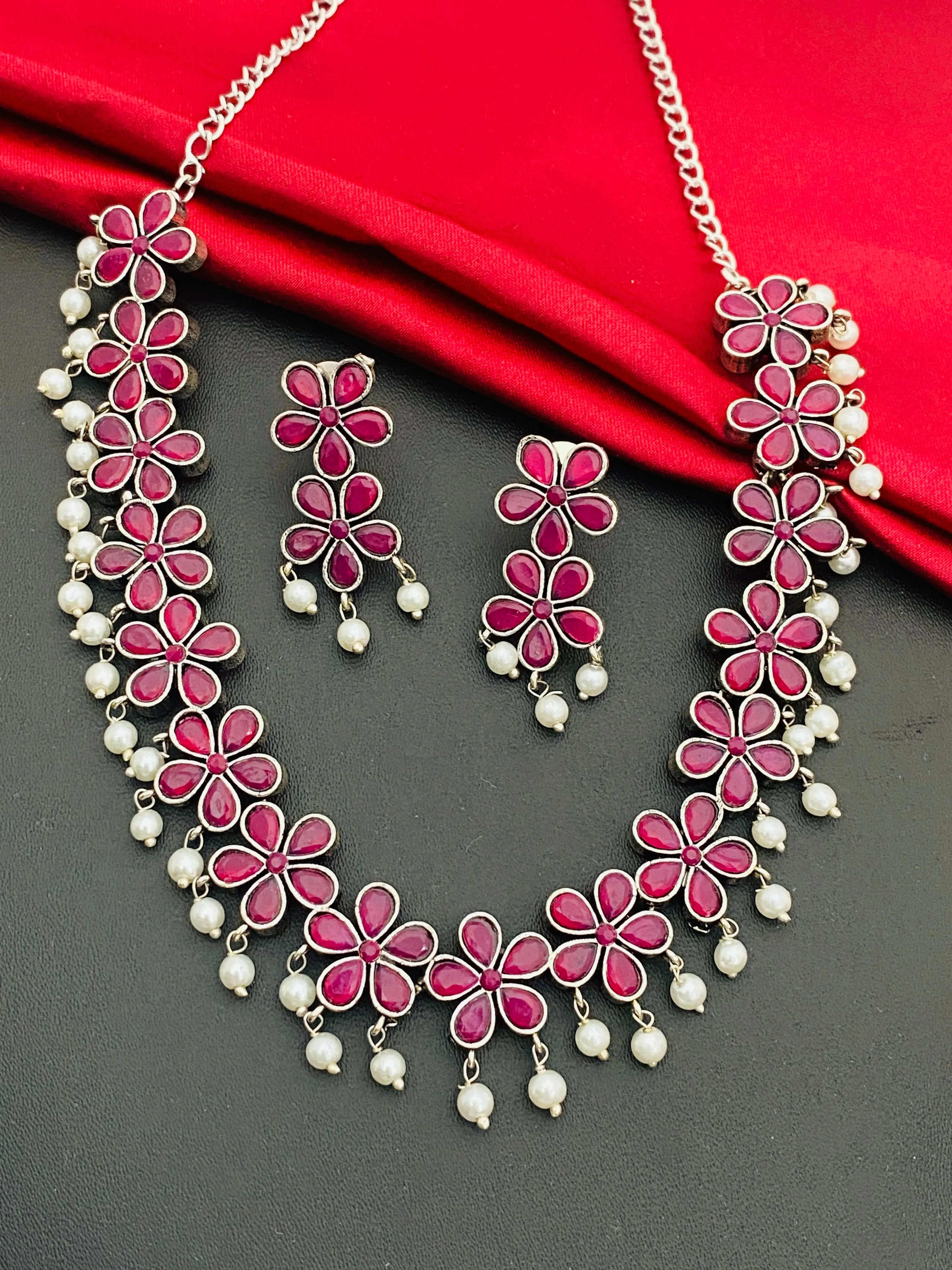 Trendy Silver Oxidized Floral Design Necklace With Ruby Stone And Pearl Hangings